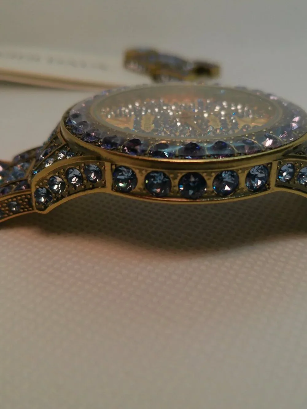 Heidi Daus quartz fashion watch bronze-tone covered with lavender-purple crystal